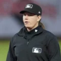 Jen Pawol will make history this weekend as the first woman to umpire a regular-season Major League Baseball game when she officiates during the three-game series between the Miami Marlins and the Atlanta Braves at Truist Park. Pawol, 48, is scheduled to serve on the bases for both games of Saturday’s doubleheader and will take the home plate position on Sunday. She began her umpiring journey in the minor leagues in 2016 after completing her training at the Umpire Training Academy in Vero Beach. In 2023, she reached Triple-A, becoming the first woman at that level in 34 years and was selected as the home-plate umpire for the Triple-A National Championship Game. Her major league experience expanded in 2024 and 2025, when she participated in MLB spring training games, becoming the first woman to do so since Ria Cortesio in 2007. That performance helped secure her place on Major League Baseball’s official call-up list. A native of West Milford, New Jersey, Pawol was a standout athlete at Hofstra University, where she earned All-Conference softball honors. She also played on the USA women’s national baseball team in 2001. With advanced degrees and a background in teaching art, she later transitioned full-time into umpiring, driven by her passion for sports and competition. Major League Baseball confirmed that a fifth umpire would be added to the officiating crew for Saturday’s doubleheader, creating the opportunity for Pawol’s debut. On Sunday, she will serve as the plate umpire for the series finale, marking a significant milestone in professional sports officiating. Her achievement adds to a growing list of gender inclusion milestones across U.S. professional sports. The NBA welcomed its first female referees in 1997, the NFL in 2015, and women have recently officiated in the men’s FIFA World Cup. Major League Baseball now joins the ranks, while the NHL remains the only major league in the U.S. without a female official. The baseball community has welcomed Pawol’s promotion. Dodgers manager Dave Roberts called it “good for the game,” and others praised her poise and professionalism during previous spring training appearances. Her elevation reflects Major League Baseball’s ongoing efforts to promote diversity and inclusion within its officiating ranks. Jen Pawol’s debut is not only a personal triumph but a momentous step for women in sports. As she takes her place on the field, she represents progress, determination, and a future where gender no longer limits opportunity in professional athletics.