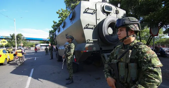 Colombia halts U.S. arms purchases after drug fight delisting