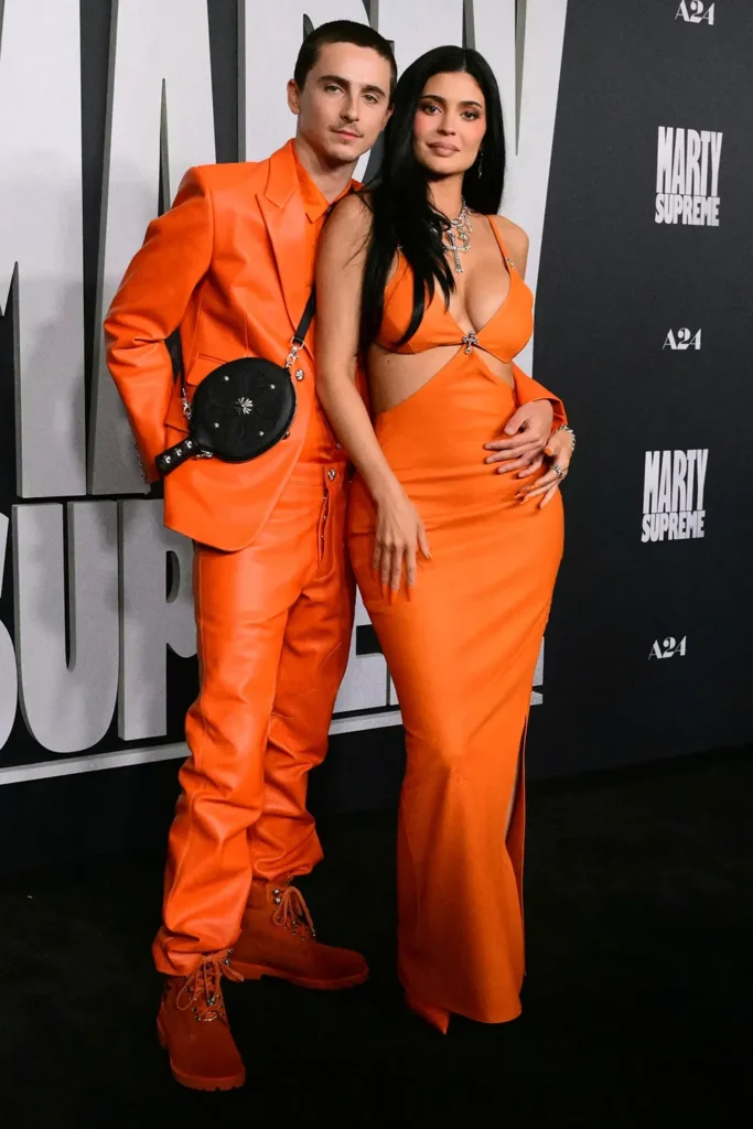 Kylie Jenner and Timothée Chalamet Twin in Matching Bright Orange Looks at Film Premiere 2 Kylie Jenner and Timothee Chalamet Twin in Matching Bright Orange Outfits for Marty Supreme Premiere1