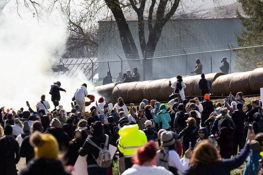 Police Tear-Gas Activists at Wisconsin Beagle Lab